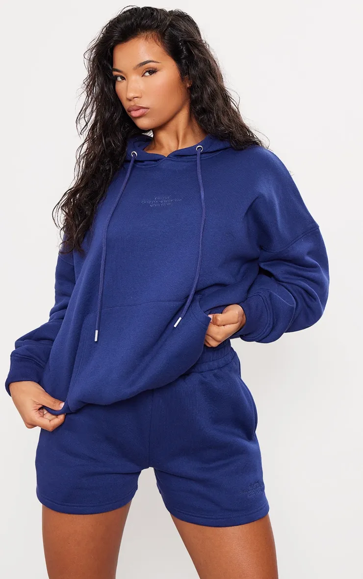 Short en sweat bleu marine à message