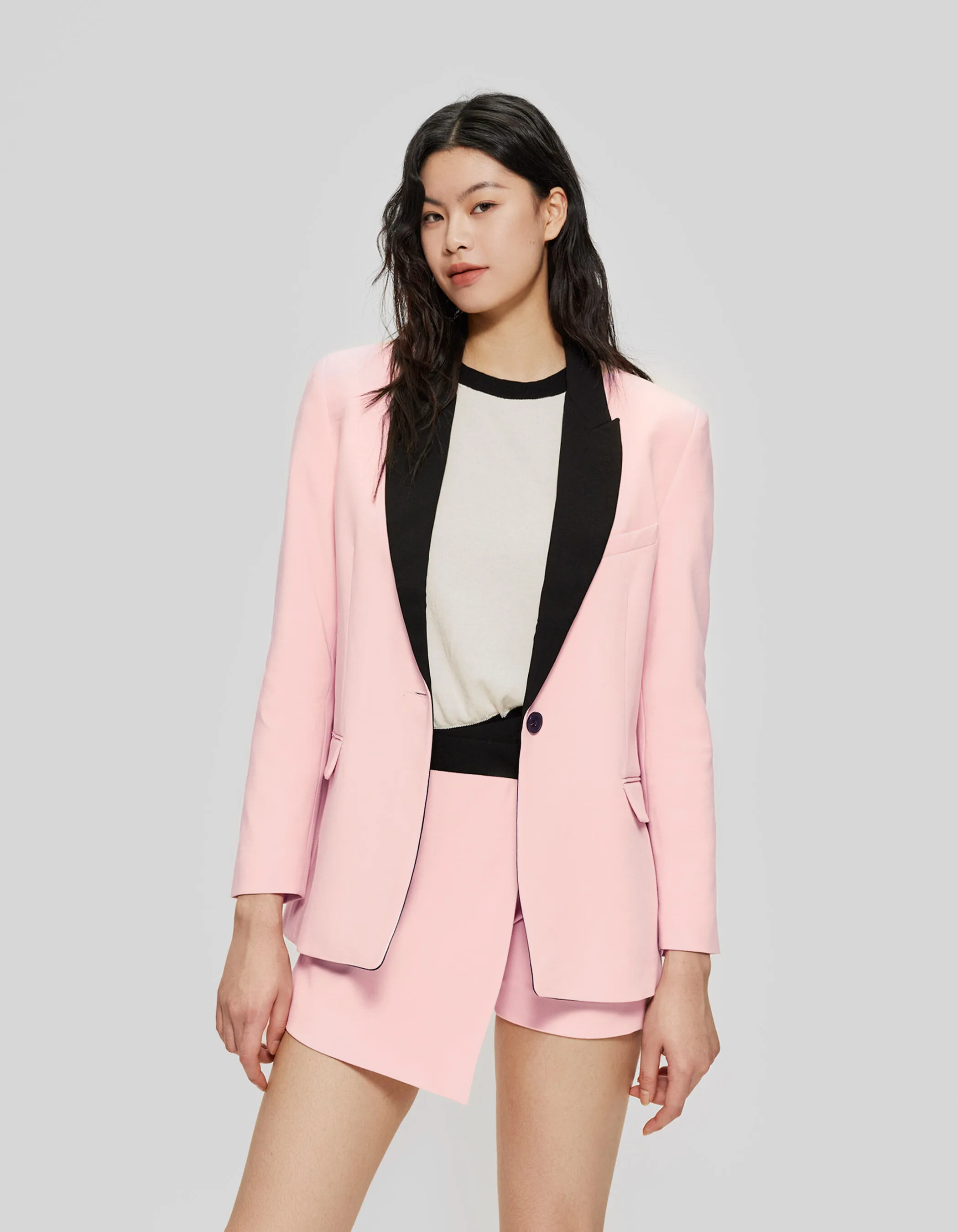 Veste de costume rose col noir Femme